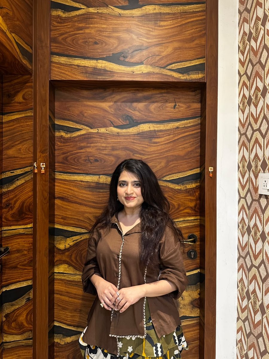 Sneha in the Coffee Jute shirt, close up